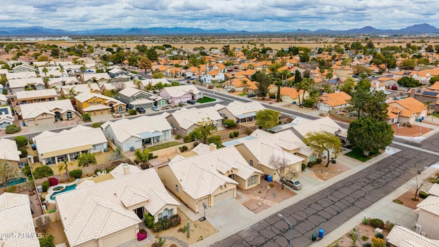 drone / aerial view featuring a mountain view and a residential view