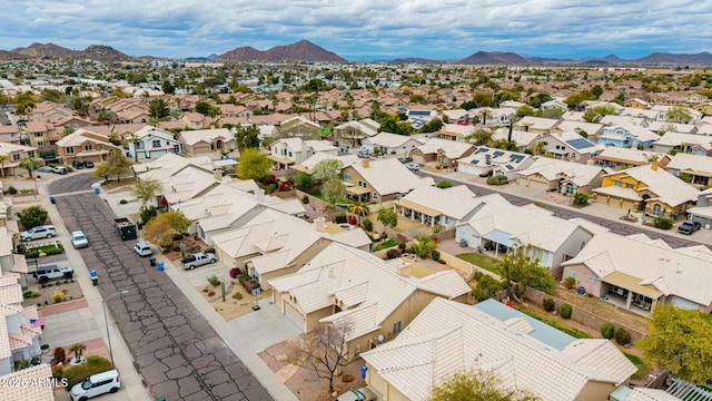 birds eye view of property featuring a residential view and a mountain view