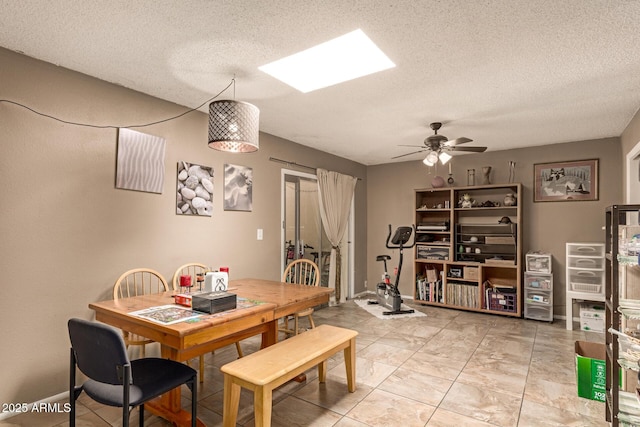 1951 E Del Sur Dr, Tempe, AZ 85283 - dining area featuring ceiling fan and a textured ceiling