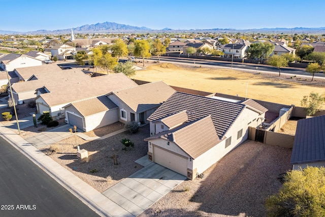 drone / aerial view featuring a mountain view