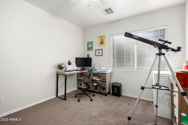 office area featuring light carpet