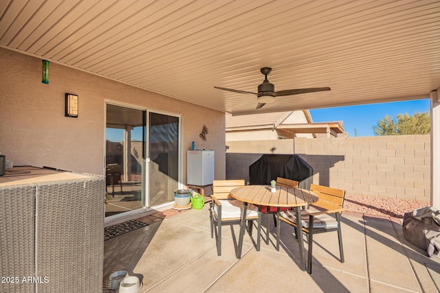 view of patio with ceiling fan