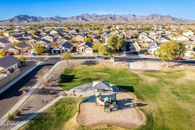 birds eye view of property featuring a mountain view