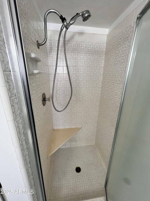 bathroom with a stall shower