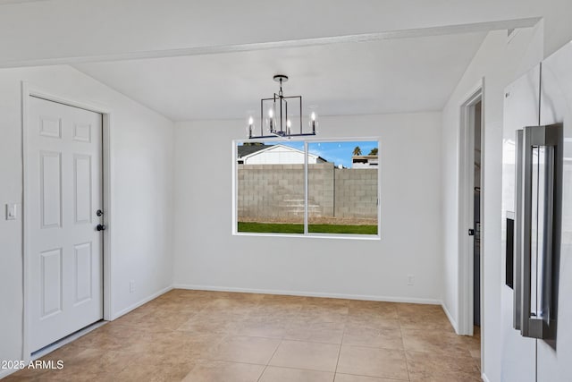 unfurnished dining area featuring a notable chandelier and light tile patterned flooring