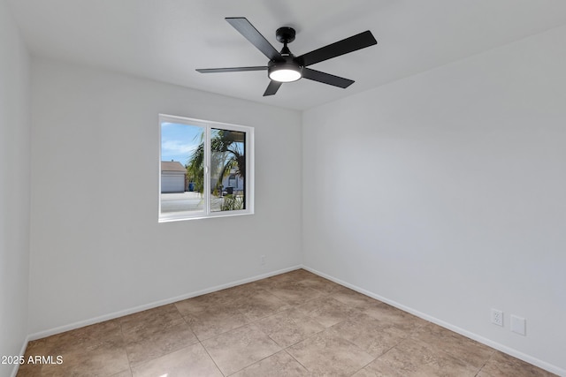 unfurnished room with ceiling fan