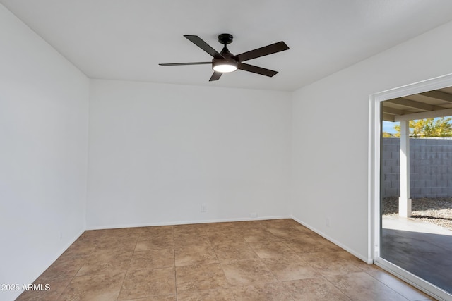 spare room with ceiling fan