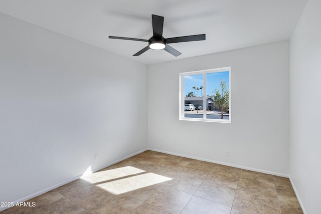 unfurnished room with ceiling fan