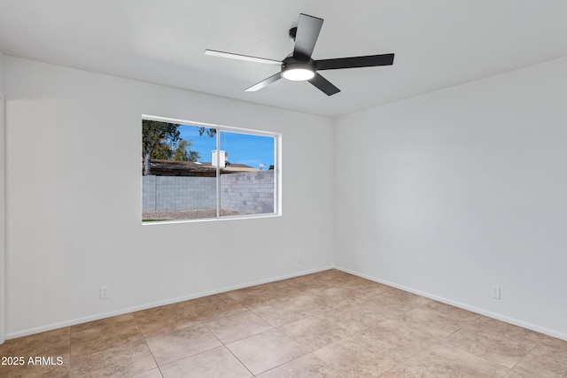 empty room featuring ceiling fan