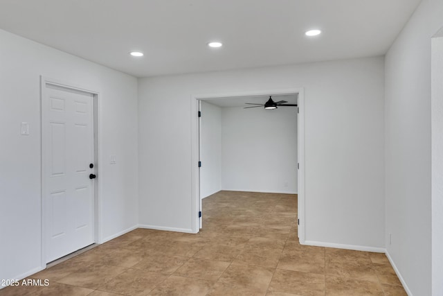 spare room featuring ceiling fan