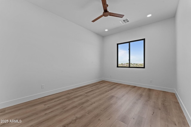 34198 S State Route 89th Hwy, Wickenburg, AZ 85390 - empty room with ceiling fan, light wood-style floors, recessed lighting, and baseboards