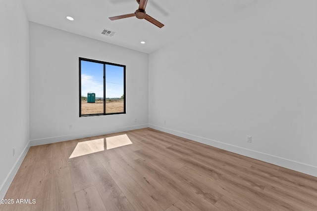 34198 S State Route 89th Hwy, Wickenburg, AZ 85390 - unfurnished room featuring light wood-style floors, baseboards, ceiling fan, and recessed lighting