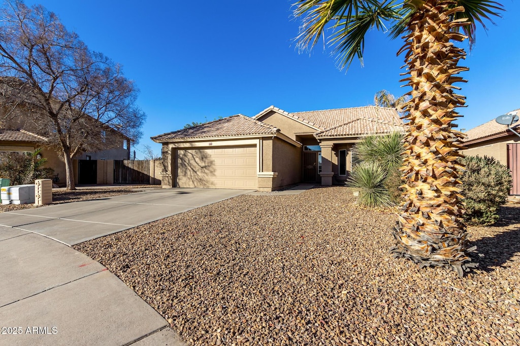 view of front of property with a garage