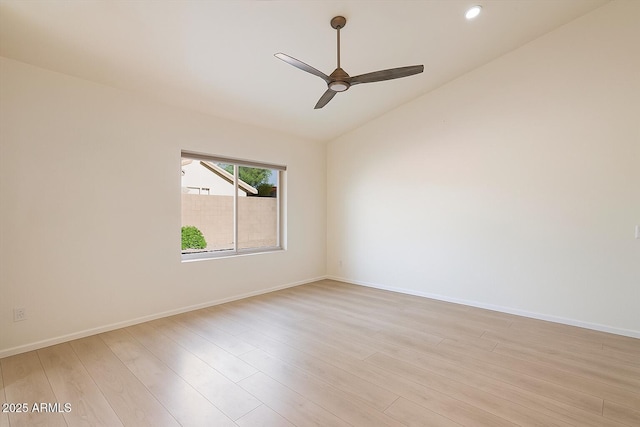 13361 N 99th Pl, Scottsdale, AZ 85260 - unfurnished room featuring ceiling fan, vaulted ceiling, light wood-style floors, baseboards, and recessed lighting