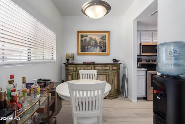 dining room featuring light hardwood / wood-style floors