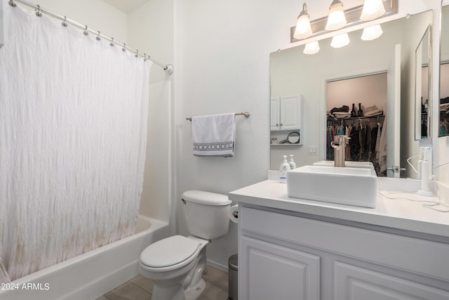 full bathroom featuring vanity, toilet, and shower / bath combo