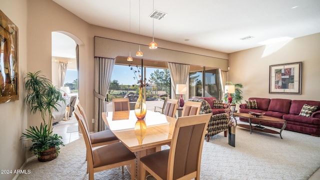 view of carpeted dining area