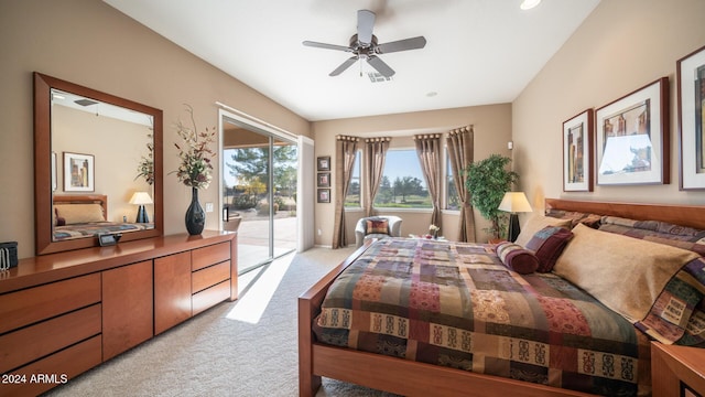 bedroom featuring ceiling fan, light colored carpet, and access to outside