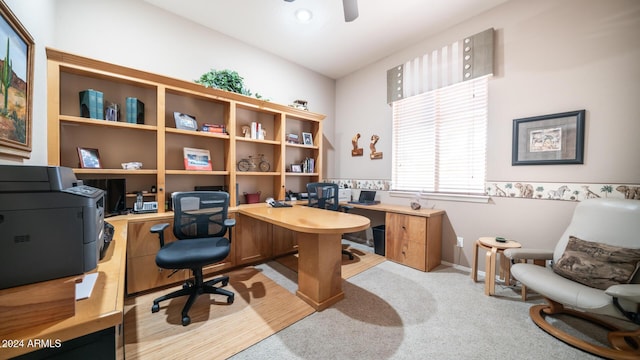 office area featuring ceiling fan and light colored carpet