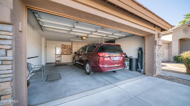 garage featuring a garage door opener