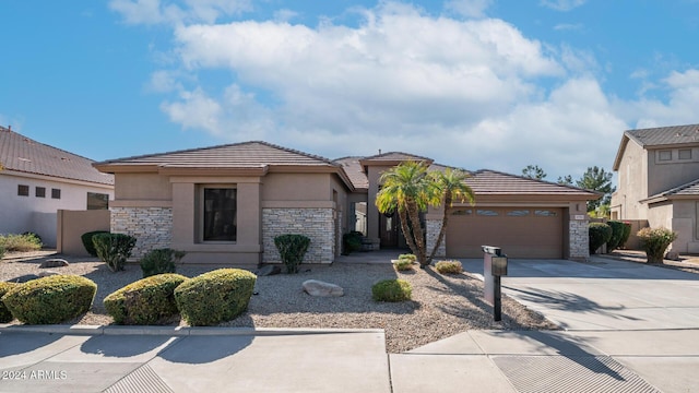 view of front of property with a garage