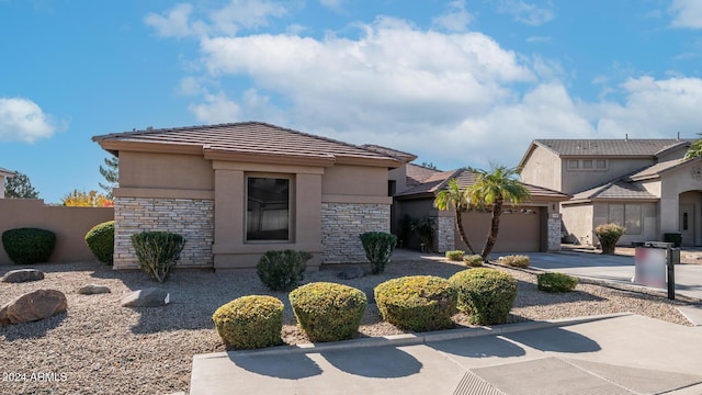 view of front of property with a garage