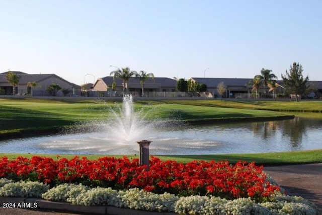 view of home's community featuring a water view