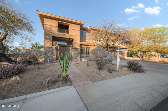 view of front of property featuring stone siding