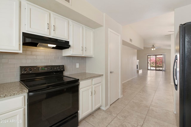 kitchen featuring stainless steel fridge, black electric range, light stone counters, ceiling fan, and white cabinets