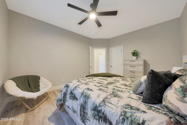4040 E Mclellan Rd Unit 16, Mesa, AZ 85205 - bedroom with wood finished floors and a ceiling fan