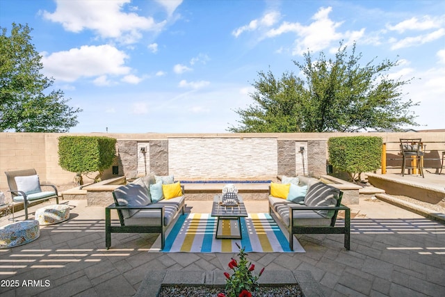 view of patio / terrace featuring a fenced backyard and outdoor lounge area