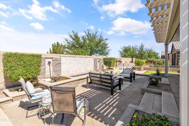 view of patio / terrace featuring a pergola, an outdoor hangout area, and a fenced backyard
