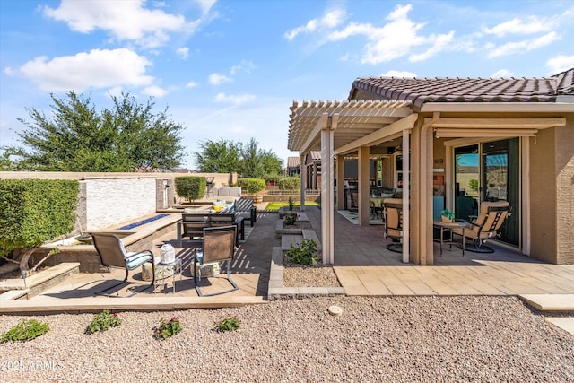 view of patio featuring fence, a pergola, and an outdoor hangout area