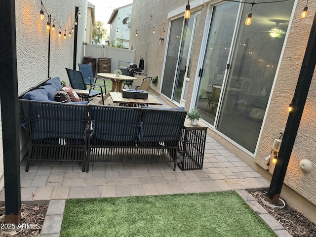 view of patio featuring fence