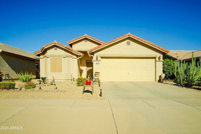 view of front of property featuring a garage