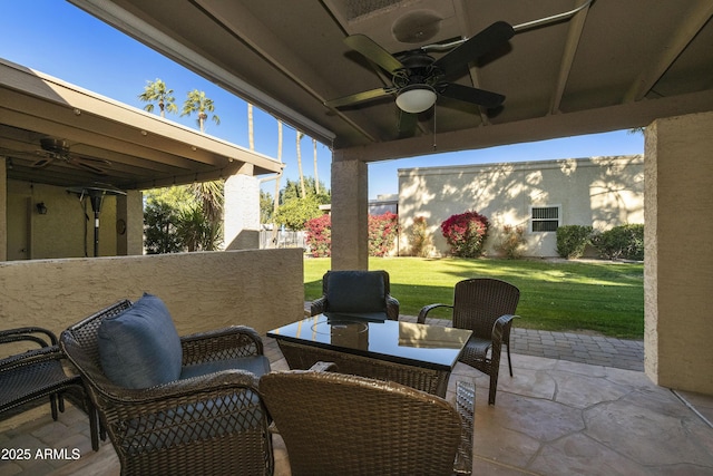 view of patio featuring ceiling fan