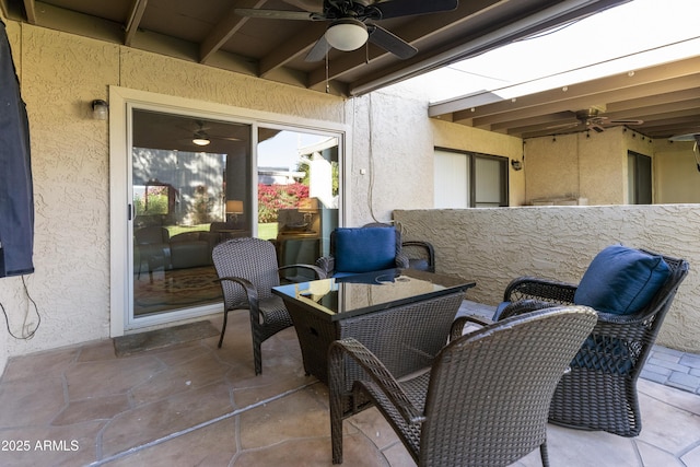 view of patio / terrace featuring ceiling fan