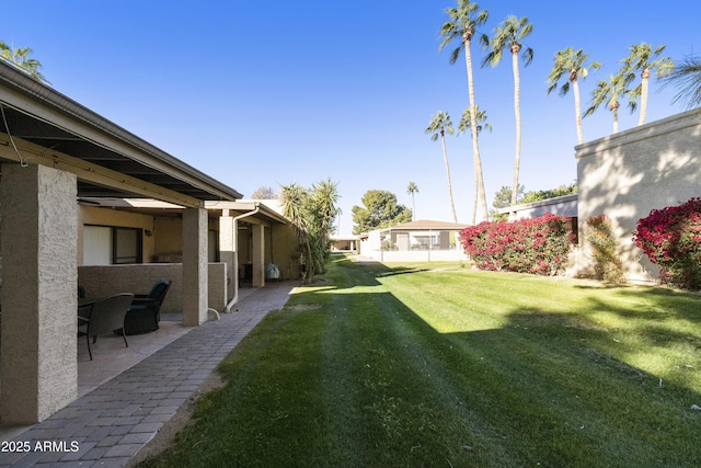 view of yard with a patio area