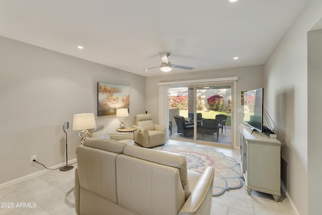 tiled living room featuring ceiling fan