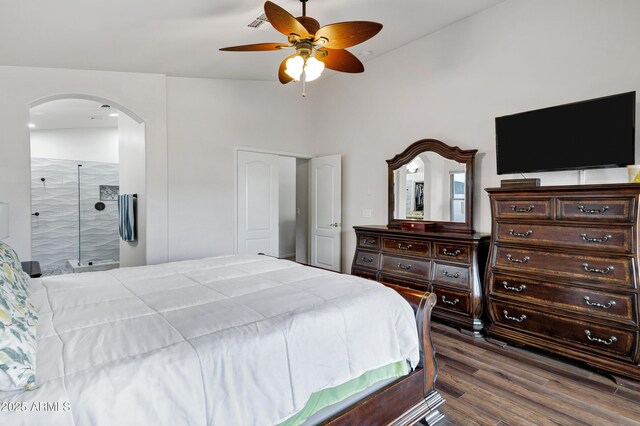 4493 E Desert Sands Dr, Chandler, AZ 85249 - bedroom featuring arched walkways, dark wood finished floors, ceiling fan, and ensuite bath