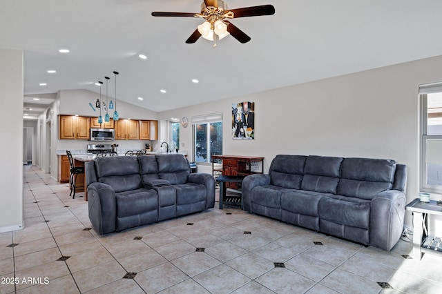 4493 E Desert Sands Dr, Chandler, AZ 85249 - living room featuring lofted ceiling, healthy amount of natural light, ceiling fan, light tile patterned floors, and recessed lighting