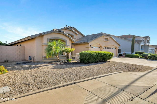 4493 E Desert Sands Dr, Chandler, AZ 85249 - mediterranean / spanish-style home with driveway, a garage, stucco siding, and a tiled roof