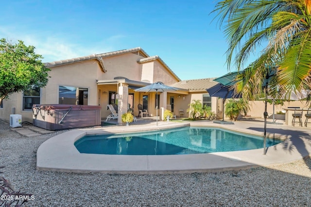 4493 E Desert Sands Dr, Chandler, AZ 85249 - view of swimming pool featuring a hot tub and a patio
