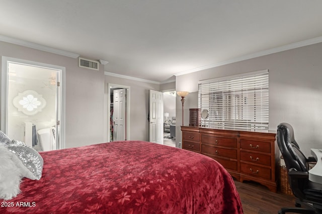 bedroom featuring dark wood-style floors, visible vents, and ornamental molding