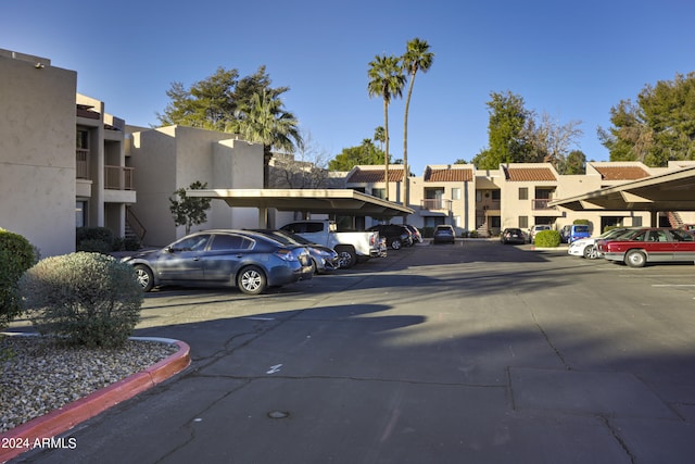 view of car parking featuring a carport