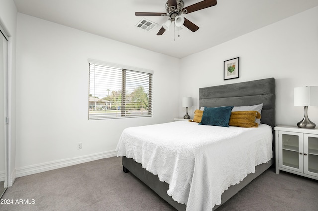 carpeted bedroom featuring ceiling fan