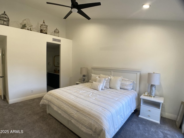 bedroom featuring ceiling fan and dark carpet