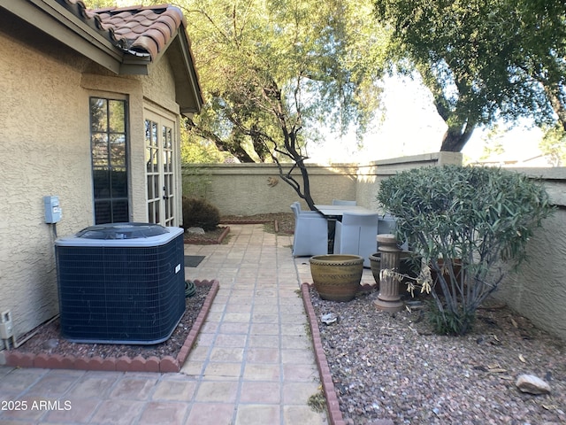 view of patio / terrace with central AC unit