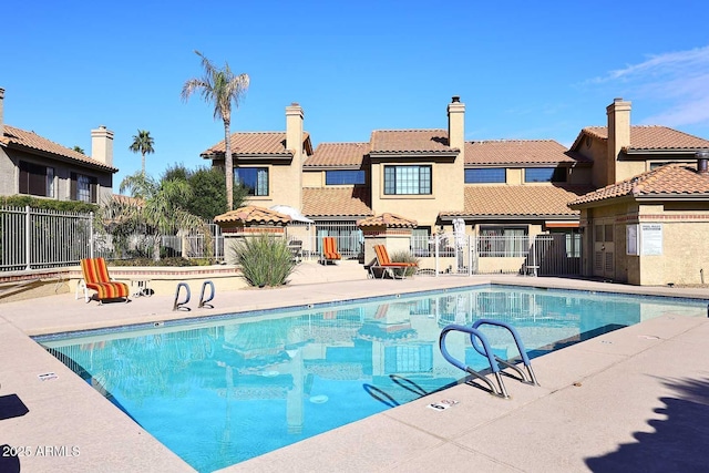 view of pool featuring a patio