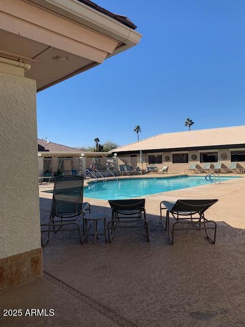 view of pool with a patio